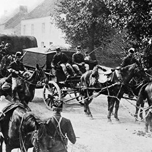 World War One - Belgian troop on horseback guard a food convoy carriage on its way to