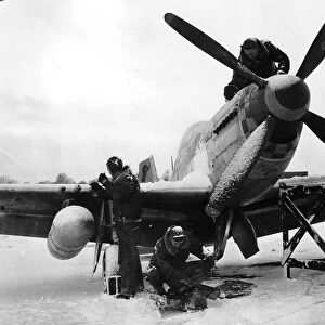 WW2 North American P51 Mustang January 1945 being maintained by the ground repair