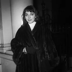 A young Joan Collins en route to the US embassy in London to apply for a visa