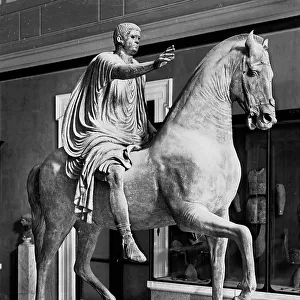 Equestrian statue of a Roman, formerly identified as Caligula. The bronze work is kept in the National Archaeological Museum in Naples