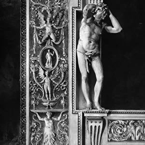 Figure depicted in high relief on the side of a niche, detail of the stucco corridor by Mazzoni in Palazzo Spada, Rome