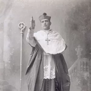 Full-length portrait of a Bishop. He is posing in the studio in the act of giving a blessing