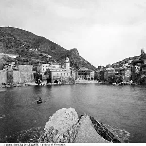 An inlet and some homes in the town of Vernazza