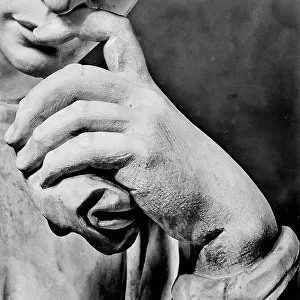 Monument to Lorenzo de'Medici: the hand resting on the lips of the statue, by Michelangelo, in the New Sacristy of the Medici Chapel, Basilica of San Lorenzo, Florence. Photograph taken during the removal of the statue during the Second World War