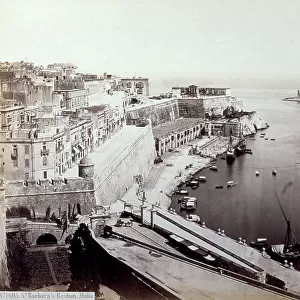 The port of la Valletta in Malta with the bastions of Santa Barbara. In the port, anchored boats