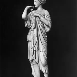 Roman copy of Diana of Gabies attributed to Praxiteles on display at the Louvre Museum, Paris