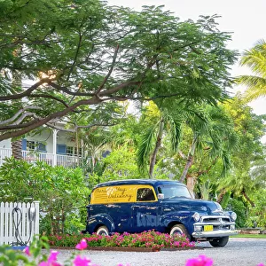 Florida, South Florida, Islamorada, The Keys, classic car parked in front of Pierre's Restaurant