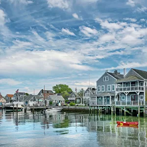 USA, Nantucket, Massachusetts, New England, shore houses and boats moored on a dock