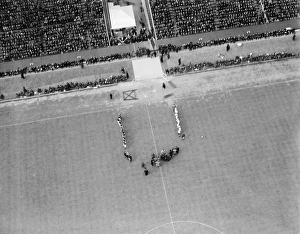 <b class=qtipBold><figcaption>1928 FA Cup Final EPW020863</figcaption></b><br>WEMBLEY STADIUM, Middlesex, London. The teams line up to greet the dignitaries before the 1928 FA Cup Final between Blackburn Rovers and Huddersfield Town. Blackburn won 3-1 in a match attended by 92, 041. Photographed on 21st April 1928. Aerofilms Collection (see Links).<br><em>© Historic England</em> 1928 FA Cup Final EPW020863