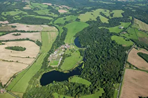 <b class=qtipBold><figcaption>Ashburnham Place 29488_048</figcaption></b><br>Ashburnham Place, East Sussex. A Capability Brown landscape garden around Ashburnham Place. While much has been demolished, some of the country house still remains.<br><em>© Historic England Archive</em> Ashburnham Place 29488_048