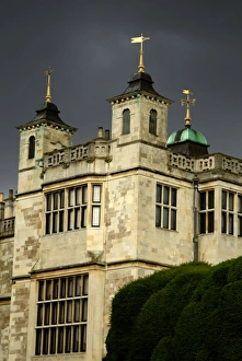 <b class=qtipBold><figcaption>Audley End House N071343</figcaption></b><br>AUDLEY END HOUSE, Essex. Turrets and weathervanes on the west front viewed from north-west against a grey stormy sky.<br><em>© Historic England</em> Audley End House N071343