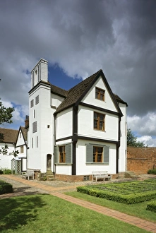 <b class=qtipBold><figcaption>Boscobel House K020660</figcaption></b><br>BOSCOBEL HOUSE, Staffordshire. View from the south with garden laid out in small formal beds edged with box and benches by the house.<br><em>© Historic England</em> Boscobel House K020660