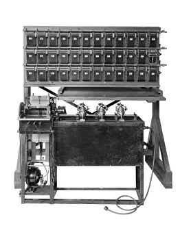 <b class=qtipBold><figcaption>A calculating machine BL21177</figcaption></b><br>Cut out of a calculating machine. The photograph was taken for the British Tabulating Company, also known as the British Tabulating Machine Company, which was formed in 1902 and later constructed a number of the machines used to break the Enigma codes at Bletchley Park during World War II. Photographed in March 1911 by Bedford Lemere and Co.<br><em>© Historic England</em> A calculating machine BL21177