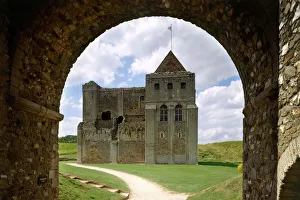 <b class=qtipBold><figcaption>Castle Rising Castle K971512</figcaption></b><br>CASTLE RISING CASTLE, Norfolk. The east face of the keep seen through the gatehouse arch.<br><em>© Historic England</em> Castle Rising Castle K971512