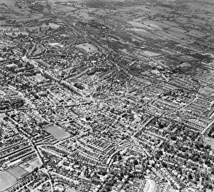 <b class=qtipBold><figcaption>Cheltenham EAW006882</figcaption></b><br>The High Street and the town centre, Cheltenham, Gloucestershire. Photographed by Aerofilms Ltd in June 1947.<br><em>© Historic England Archive</em> Cheltenham EAW006882