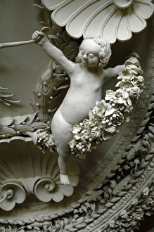 <b class=qtipBold><figcaption>Cherub DP033762</figcaption></b><br>Astley Hall, Astley Park, Chorley, Lancashire. Detail of a cherub on the ornate stucco ceiling in the drawing room<br><em>© Historic England Archive</em> Cherub DP033762