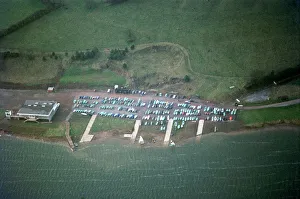 <b class=qtipBold><figcaption>Chew Valley Lake JEH_22048_032</figcaption></b><br>Chew Valley Lake Sailing Club, Somerset. The reservoir at Chew Valley was opened in 1956 to provide drinking water for Bristol. Opportunities were soon taken to use the lake for leisure activities. The sailing club was first established in 1966. Photographed in December 1970 by Jim Hancock.<br><em>© Historic England Archive</em> Chew Valley Lake JEH_22048_032
