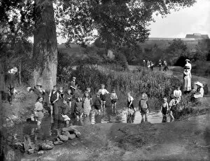 Victorian people and costumes Collection: Children playing in a pond in 1914 CC71_00076