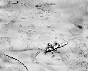 <b class=qtipBold><figcaption>Crashed aircraft EAW014625</figcaption></b><br>The wreckage of a Douglas Invader A-26B light bomber at Warton Bank, Lancashire. Photographed by Aerofilms on 21st April 1948. This plane crashed on 29th November 1944 shortly after take-off. The story is outlined here: http://laituk.org/Time%20Team.htm.<br><em>© Historic England</em> Crashed aircraft EAW014625