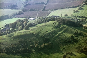 <b class=qtipBold><figcaption>Dixton Hill JEH_22045_058</figcaption></b><br>Dixton Hill, Alderton, Gloucestershire. An Iron Age hillfort with a Norman motte and bailey castle superimposed at the south-east end. Photographed in October 1970 by Jim Hancock.<br><em>© Historic England Archive</em> Dixton Hill JEH_22045_058