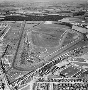 <b class=qtipBold><figcaption>Doncaster Racecourse EAW049620</figcaption></b><br>DONCASTER RACECOURSE. Aerial view of the racecourse with a meet in progress. Belle Vue, home of Doncaster Rovers Football Club, is adjacent in the foreground. Photographed in May 1953. Aerofilms Collection (see Links).<br><em>© Historic England</em> Doncaster Racecourse EAW049620