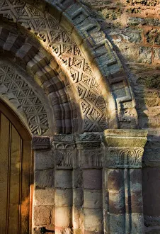 <b class=qtipBold><figcaption>Doorway arch DP031894</figcaption></b><br>ST PETER'S CHURCH, Bromyard, Herefordshire. Detail view of the south Norman doorway.<br><em>© Historic England</em> Doorway arch DP031894
