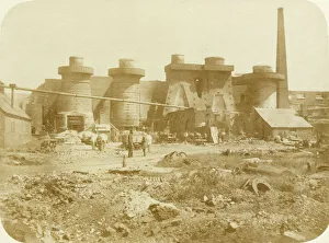 <b class=qtipBold><figcaption>Dudley blast furnaces OP02658</figcaption></b><br>Blast furnace, Russell's Hall, Dudley, West Midlands, 1859. Mr Mills, dilute albumen print. Mr Mills, otherwise unknown as a photographer, recorded the blast furnaces at Russell's Hall, west of Dudley, when the industry was producing a vast number of iron products, including nails, boilers, vices and chains. Coal mining around Dudley had been recorded in the early 13th century and the area was famous for the manufacture of iron nails in the early 16th century. By the late 18th century Dudley was at the centre of England's iron industry, and the region was dubbed the 'Black Country' because of the blackening of the landscape by the coal and iron industries. Russell's Hall itself was pockmarked by clay pits and coal shafts, and significant urban development only took place after the Second World War.<br><em>© Historic England</em> Dudley blast furnaces OP02658