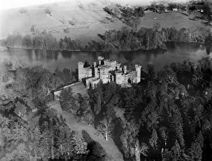 <b class=qtipBold><figcaption>Eastnor Castle EPW005397</figcaption></b><br>EASTNOR CASTLE, near Ledbury, Herefordshire. Aerial view of Eastnor Castle, built in 1812-20 by Robert Smirke to look like a medieval castle. Photographed in March 1921. Aerofilms Collection (see Links).<br><em>© Historic England</em> Eastnor Castle EPW005397