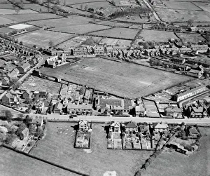 <b class=qtipBold><figcaption>Elastic Factory, Ibstock EAW000185</figcaption></b><br>The Clutsom and Kemp Ltd Elastic Factory and adjacent playing field, Ibstock, Leicestershire. Photographed by Aerofilms Ltd in April 1946.<br><em>© Historic England Archive</em> Elastic Factory, Ibstock EAW000185