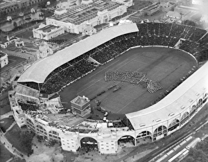 <b class=qtipBold><figcaption>Empire Day 1924 EPW010455</figcaption></b><br>WEMBLEY STADIUM, Middlesex, London. Empire Day celebrations in 1924, part of Empire Week (24th-31st May 1924). Massed military marching bands entertained a packed house between 3 and 8.30pm. Photographed on 25th May 1924. Aerofilms Collection (see Links).<br><em>© Historic England</em> Empire Day 1924 EPW010455