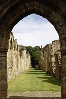 <b class=qtipBold><figcaption>Finchale Priory K991234</figcaption></b><br>FINCHALE PRIORY, Durham. View through the doorway at the west end of the nave of the whole length of the church.<br><em>© Historic England</em> Finchale Priory K991234