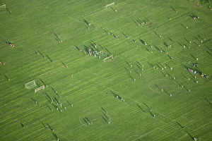 <b class=qtipBold><figcaption>Football 24394_047</figcaption></b><br>HACKNEY MARSHES, London. Aerial view of football games in progress.<br><em>© Historic England</em> Football 24394_047
