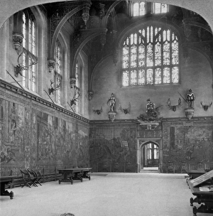 <b class=qtipBold><figcaption>Hampton Court Palace BB85_03133</figcaption></b><br>GREAT HALL, Hampton Court Palace, Richmond-upon-Thames, London. Begun for Cardinal Wolsey in 1514, but following his disgrace the palace was seized by Henry VIII. The Great Hall was built for Henry VIII in 1523-4 to replace Cardinal Wolsey's hall. The tapestries date from a similar period. Photographed in 1903. Howarth-Loomes Collection.<br><em>© Historic England</em> Hampton Court Palace BB85_03133