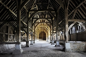 <b class=qtipBold><figcaption>Harmondsworth Great Barn N120004</figcaption></b><br>HARMONDSWORTH GREAT BARN, Greater London. Interior view. Medieval timber framed barn built in 1426-7 by Winchester College. The Great Barn is one of the largest ever known to have been built in England, and one of the most complete and unaltered pre-Dissolution buildings in Britain. "Cathedral of Middlesex" Sir John Betjeman.<br><em>© Historic England</em> Harmondsworth Great Barn N120004