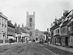 <b class=qtipBold><figcaption>Hart Street, Henley CC73_00184</figcaption></b><br>HENLEY-ON-THAMES, Oxfordshire. View of St Marys Church, looking down Hart Street towards the distinctive flint and stone chequer patterned church tower with polygonal angle buttresses, dating to the 16th century. On the right are some timber-framed town houses with dormer windows. Photographed by Henry Taunt in 1890.<br><em>© Historic England</em> Hart Street, Henley CC73_00184