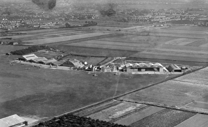 <b class=qtipBold><figcaption>Heston Airport EPR001299</figcaption></b><br>Heston Aerodrome, Hounslow, London. Aerial view by Aeropictorial. Heston operated as an airport between 1929 and 1947. February 1936. Aerofilms Collection.<br><em>© Historic England</em> Heston Airport EPR001299