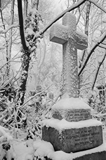 <b class=qtipBold><figcaption>Highgate Cemetery MF001674_22</figcaption></b><br>HIGHGATE CEMETERY, Hampstead, London. Snow covering the grave of Jean Louis and Elizabeth Cameron Mieville in the West Cemetery. Photographed by John Gay in winter between 1980 and 1984.<br><em>© Historic England</em> Highgate Cemetery MF001674_22