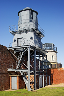 <b class=qtipBold><figcaption>Hurst Castle lighthouses N120051</figcaption></b><br>HURST CASTLE, Hampshire. View of the 1911 lighthouse with the 1865 lighthouse beyond.<br><em>© Historic England</em> Hurst Castle lighthouses N120051