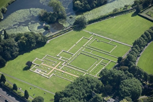 <b class=qtipBold><figcaption>Leicester Abbey 27591_006</figcaption></b><br>Abbey Park, Leicester. Outline of the Abbey of St Mary de Pratis, Leicester. An Augustinian house founded in 12th century. After the dissolution it was occupied as Cavendish House, but was destroyed by fire in 1645. The outline of the buildings were picked out in stone after excavation in the 1920s and 1930s.<br><em>© Historic England</em> Leicester Abbey 27591_006