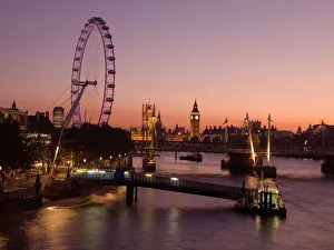 <b class=qtipBold><figcaption>The London Eye N061026</figcaption></b><br>Late evening view from Waterloo Bridge along the River Thames towards the London Eye and the Palace of Westminster including Big Ben clock tower.<br><em>© Historic England</em> The London Eye N061026