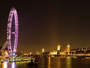 <b class=qtipBold><figcaption>The London Eye N061027</figcaption></b><br>THE LONDON EYE. Night view of the London Eye and Palace of Westminster including the Big Ben clock tower.<br><em>© Historic England</em> The London Eye N061027