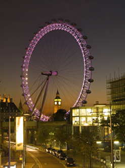 <b class=qtipBold><figcaption>The London Eye N061028</figcaption></b><br>THE LONDON EYE. Dusk view showing the London Eye including Big Ben clock tower in the distance.<br><em>© Historic England</em> The London Eye N061028