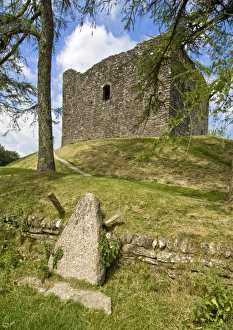 <b class=qtipBold><figcaption>Lydford Castle N090119</figcaption></b><br>LYDFORD CASTLE, Devon. View of the commemorative Viking style runic stone located next to the castle. The stone was set in place in 1997 as part of the commemorative 1000th anniversary of the Viking attack.<br><em>© Historic England</em> Lydford Castle N090119