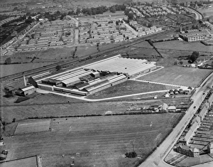 <b class=qtipBold><figcaption>Macintosh Works, Sinfin EPW041821</figcaption></b><br>The Macintosh Cable Co Works, Sinfin, Derby. Photographed by Aerofilms Ltd in June 1933.<br><em>© Historic England Archive</em> Macintosh Works, Sinfin EPW041821