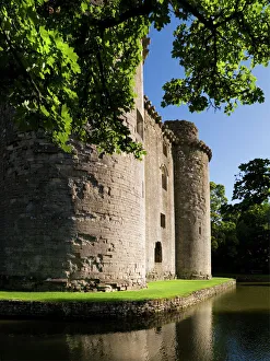 <b class=qtipBold><figcaption>Nunney Castle N080695</figcaption></b><br>NUNNEY CASTLE, Somerset. View of the 14th century French style castle and moat.<br><em>© Historic England</em> Nunney Castle N080695
