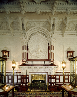 <b class=qtipBold><figcaption>Osborne House J060013</figcaption></b><br>OSBORNE HOUSE, East Cowes, Isle of Wight. Interior view of the Durbar Room fireplace and peacock over the chimney-piece. Some items shown maybe on loan from the Royal Collection.<br><em>© Historic England</em> Osborne House J060013