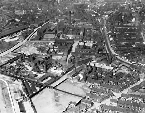 <b class=qtipBold><figcaption>The Potteries EPW045337</figcaption></b><br>FAIRFIELD POTTERY, Slippery Lane, Hanley, Stoke-on-Trent. The heart of the potteries with a series of kilns, towers and workshops producing all kinds of ceramics. A G Hackney & Co for whom the photograph was taken ran an industrial porcelain works here. Also in this shot from July 1933 are a rope works, Britannia Pottery, Havelock Works, Vulcan Pottery, St James Street Pottery and others. Aerofilms Collection (see Links).<br><em>© Historic England</em> The Potteries EPW045337