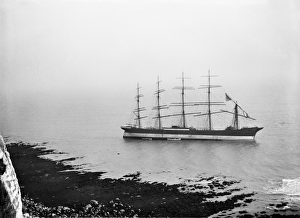 <b class=qtipBold><figcaption>The Preussen DAR_P01</figcaption></b><br>The German schooner The Preussen, run aground in St Margaret's Bay, Kent. The Preussen was the largest sailing vessel in the world at the time of her loss in November 1910. She collided with the SS Brighton on the morning of 06 November 1910. She managed to anchor off Dungeness, but the cables parted and she was driven out to sea. Tugs then towed her towards Dover, but she ran ashore off St Margaret's Bay. Between 04-11 January 1911 gales caused her to break in two. Photographed in November 1910 by Annette Evelyn Darwall.<br><em>© Historic England Archive</em> The Preussen DAR_P01