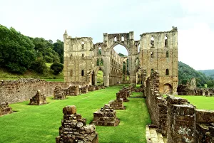 <b class=qtipBold><figcaption>Rievaulx Abbey N060078</figcaption></b><br>RIEVAULX ABBEY, North Yorkshire. View of the crossing from the nave.<br><em>© Historic England</em> Rievaulx Abbey N060078