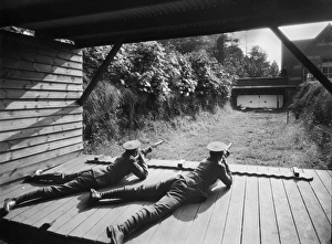 <b class=qtipBold><figcaption>Rifle range CC46_00208</figcaption></b><br>Reading School, Erleigh Road, Reading. Cadets in the Officer Training Corps using a firing range. Photographed by Marshall Keene and Company between 1920 and 1939.<br><em>© Historic England Archive</em> Rifle range CC46_00208